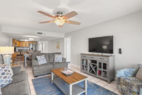 Living Room with Sleeper Sofa and Balcony Access