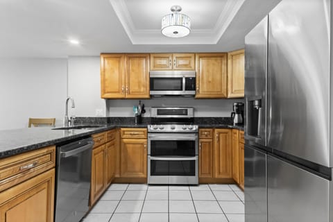 Fully Stocked Kitchen with Stainless Steel Appliances