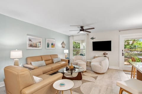Beautifully Updated Sailmaker Villa with Open Concept Living Space with Flat Screen Smart TV and Access To Private Covered Patio