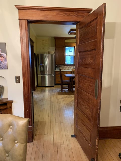 Swinging door entry into kitchen 