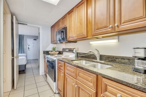 Modern and stylish kitchen. Got all the kitchen essentials. Prepare your meals while enjoying the oceanview.