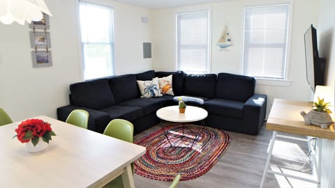 Living Room with Dining Area and Work Space