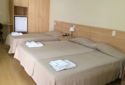 Triple Room | Minibar, in-room safe, desk, free WiFi
