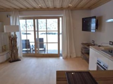Luxury Apartment | Living area | TV, iPod dock