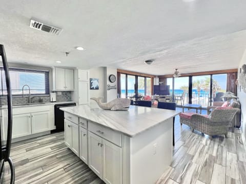 Beachfront, 2nd Floor End Unit with 740 sq ft Wrap-A-Round Balcony!