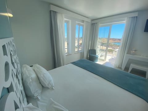 Double Room, Terrace, Sea View | Minibar, blackout drapes, iron/ironing board (on request), WiFi (free)