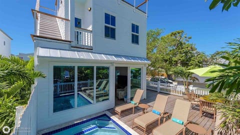 DANCE OF THE BUTTERFLIES is a newly constructed home that backs up to the famous Butterfly Museum...