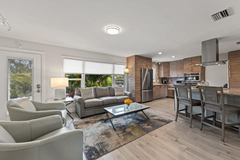 Bright, open living area with plush seating and serene views.