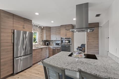 Fully equipped kitchen with stainless appliances and everything you need to cook in.