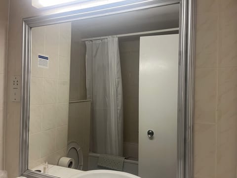 Twin Room | Bathroom | Shower, hair dryer, towels
