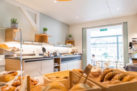 Breakfast, lunch, dinner served; local cuisine, alfresco dining 