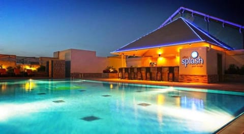 Outdoor pool, open 8:00 AM to 10:00 PM, lifeguards on site