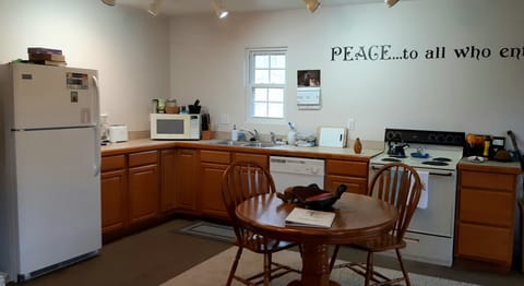 Fully equipped kitchen and dining area