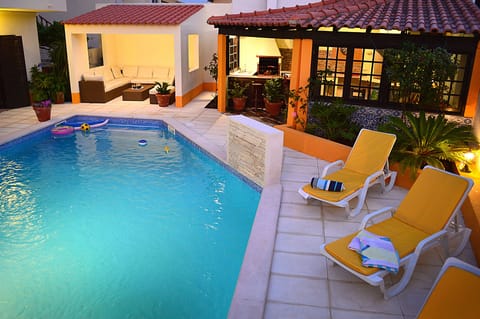 Pool area with sun loungers