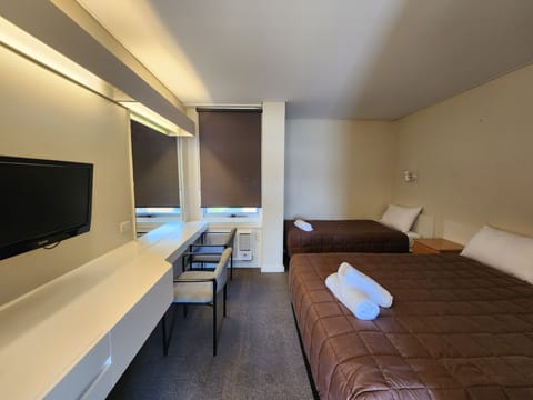 Economy Twin Room, 1 Bedroom, Non Smoking | Iron/ironing board, free WiFi, bed sheets