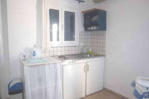 Standard Apartment, Sea View | Private kitchen | Dining tables