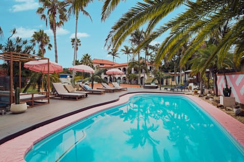 Outdoor pool, open 7:00 AM to 9:00 PM, pool umbrellas, sun loungers