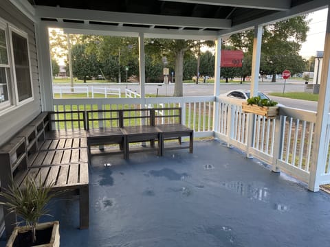 Enjoy coffee and fresh air in the front porch.