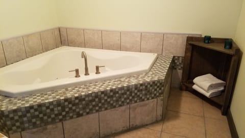 Relax in jacuzzi tub.