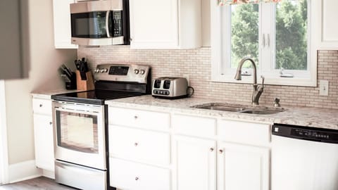 Kitchen is fully stocked for all of your cooking and dining needs