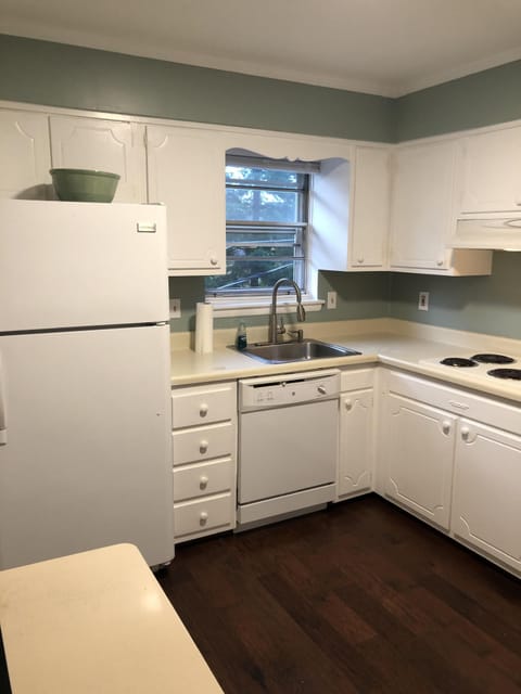 Kitchen with coffee pot, microwave and double oven