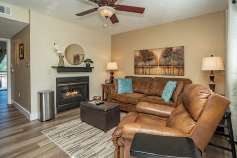 Sink into plush leather seating by your own cozy fireplace, perfect for unwinding after exploring the area. Warm tones and thoughtful touches make this inviting space feel like home.