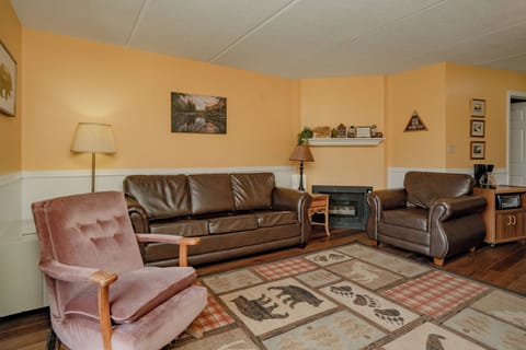 Settle into these comfy leather sofas and cozy armchairs after a day exploring—your peaceful home base awaits with warm lighting and rustic charm.