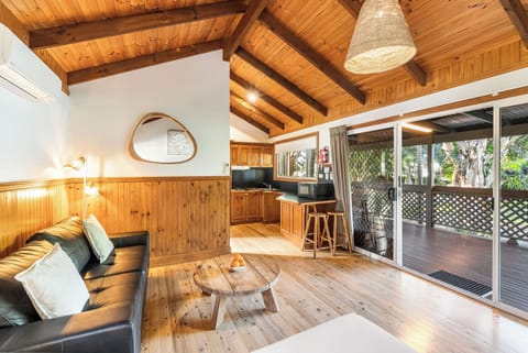 Cabin (Casuarina Cabin) | Living area | Flat-screen TV, DVD player