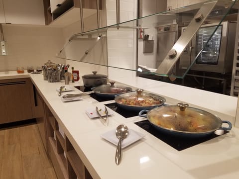 Daily buffet breakfast (USD 8 per person)