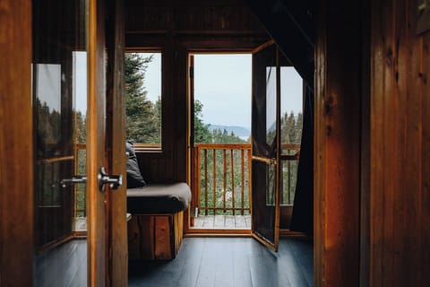 Tree House, Terrace, River View | Blackout drapes, travel crib, bed sheets