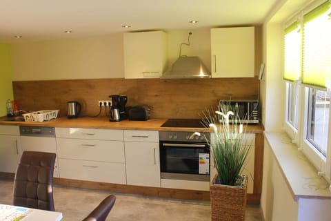 Apartment | Private kitchen | Full-size fridge, stovetop, toaster, coffee grinder