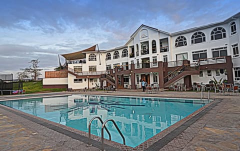 Outdoor pool, pool umbrellas, sun loungers