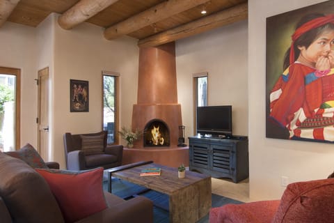 Open concept living room with kiva 