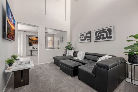 Multiple gathering areas with comfortable seating.