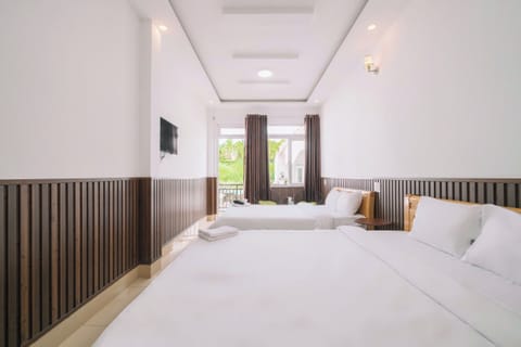 Quadruple Room with Balcony | Premium bedding, memory foam beds, individually decorated