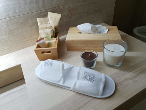 Hair dryer, slippers, bidet, towels