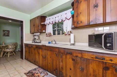 Indoors, Room, Flooring, Hardwood, Furniture