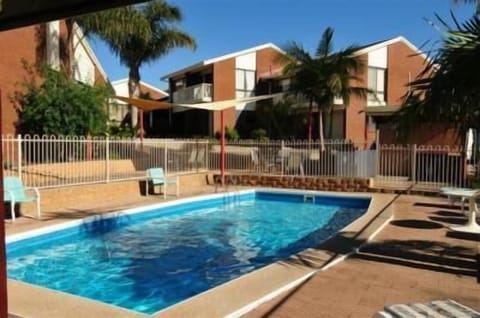 Outdoor pool, open 8:00 AM to 8:00 PM, sun loungers
