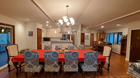 With the oak table in the background the dining room seats 18 people. 