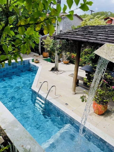Outdoor pool, open 8:00 AM to 10:00 PM, sun loungers