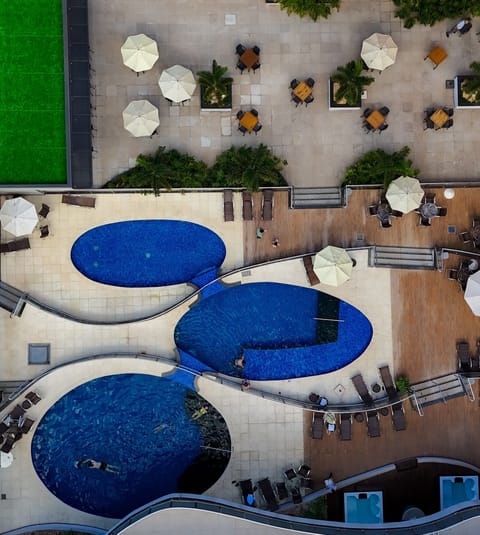 3 outdoor pools, open 10:00 AM to 10:00 PM, pool umbrellas, sun loungers