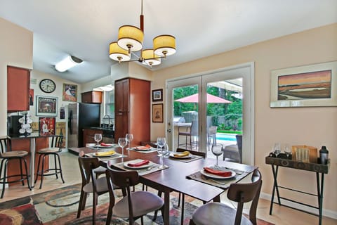 Dining room into kitchen with counter stools