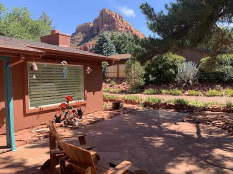Lovely shady area in the front of the home to sit and enjoy the view.