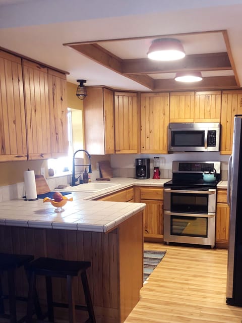 kitchen: coffee maker, blender,  cast iron, dishwasher, microwave