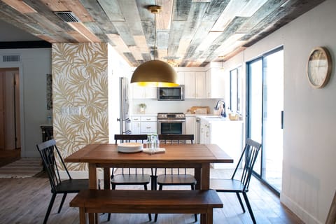 Kitchen with reclaimed wood ceilings fully stocked