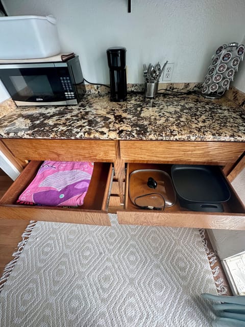 Left side beach towels and right side there’s a hot plate