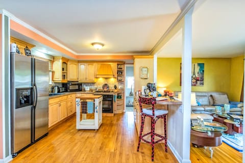 Kitchen Area with Bar counter overlooking Living Room
