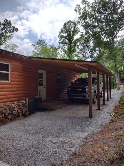 Covered carport and entrance to the cabin.