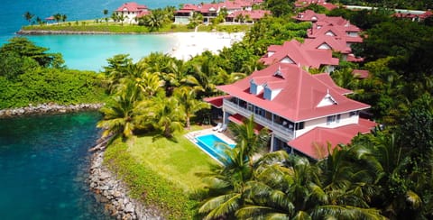 Villa 133 from the air - private, next to beach with snorkelling spot in front