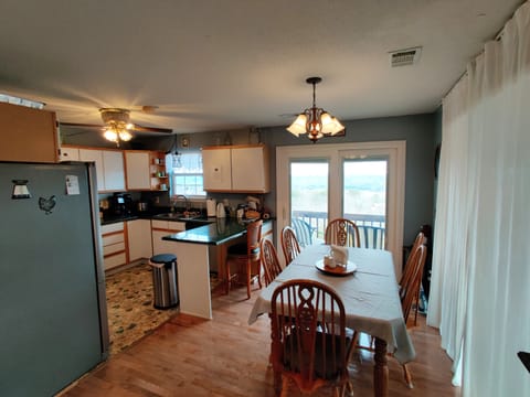 Upstairs dining table and kitchen